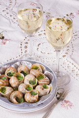 White wine and grape snail