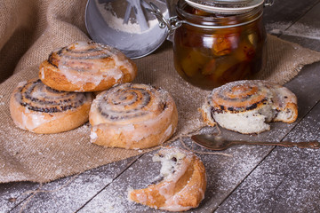 Homemade buns with poppy seed and jam
