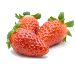 Three strawberries isolated on white background