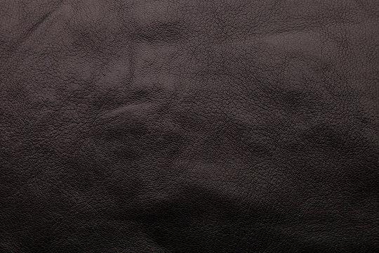 Black leather square background, leather texture.