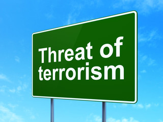 Politics concept: Threat Of Terrorism on road sign background