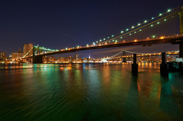 Brooklyn Bridge with lower Manhattan skyline at night