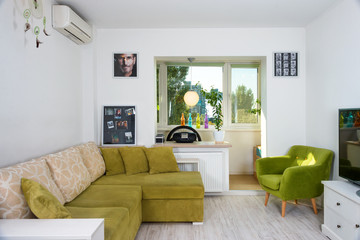Modern simple interior in light apartments. Living room interior
