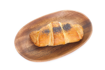Fresh and tasty croissant over white background