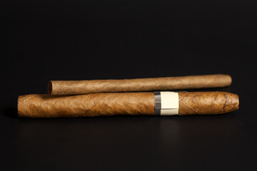 Cuban cigars on black background