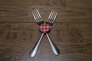 Heart with fork as a concept of happy valentines day. Love. 