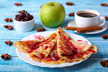 Breakfast pancakes with cherry jam