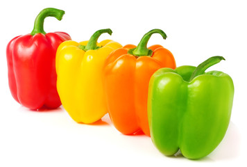 colored sweet peppers on a white background