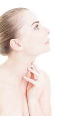 Fototapeta na wymiar Profile view of woman touching her neck skin