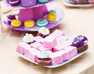 Sweet holiday buffet with cupcakes  and other desserts