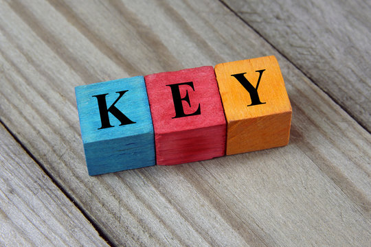 key text on colorful wooden cubes