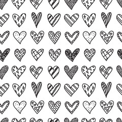 Hand drawn seamless pattern with doodle hearts