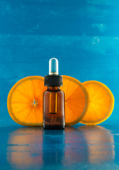 essential oil with orange slices, bottle and dropper - 100139616