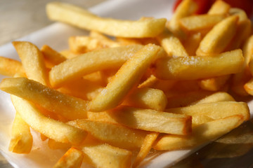 Golden French fries potatoes ready to be eaten