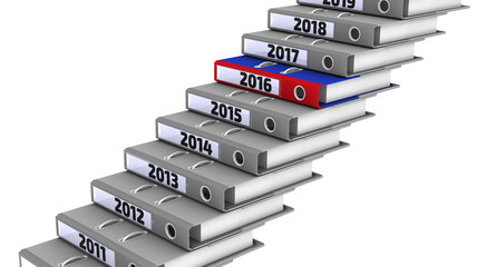 Folders stacked in the form of steps, marked the years 2011-2019. Focus for 2016