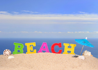 Beach letters on a beach sand