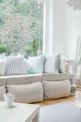 White sofa with cushions