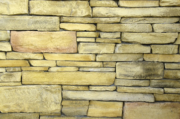 The texture of multicolored bricks.