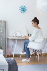 Young woman in domestic office