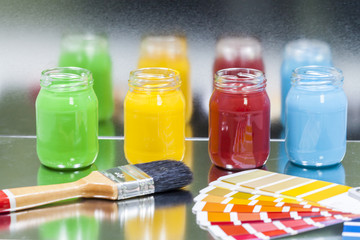 Colorful paints in jars