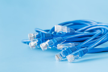blue computer ethernet cable on blue background