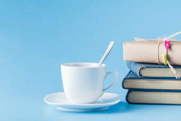 Old books and cup of coffee