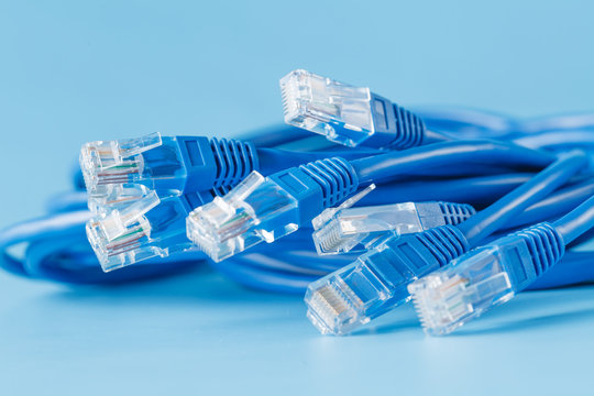 blue computer ethernet cable on blue background