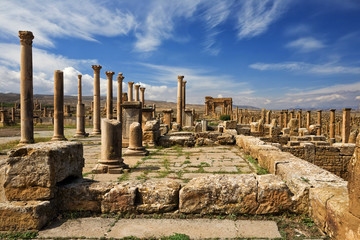 Algeria. Timgad (ancient Thamugadi or Thamugas). Row of columns at the forum and colonnade along...