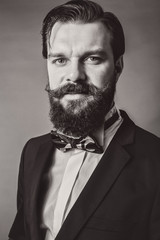 Portrait of a fashionable young man with retro look