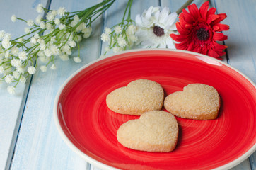 Heart-shaped butter cookies with sugar.