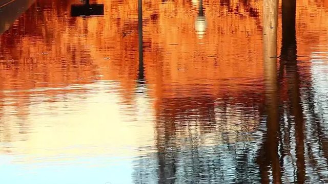 A static closeup shot of water shimmering in the light.