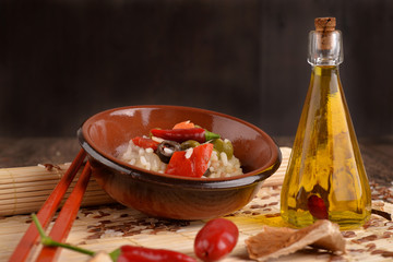 Rice salad with vegetables in bowl