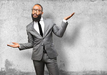 business black man doing a balance