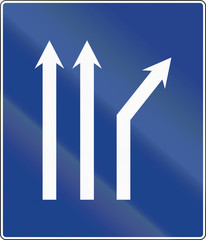Road sign used in Spain - Fork right on three-lane carriageway
