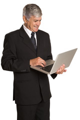 Portrait of a businessman with a tablet computer.