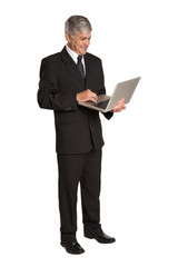 Naklejka na ściany i meble Portrait of a businessman with a tablet computer.