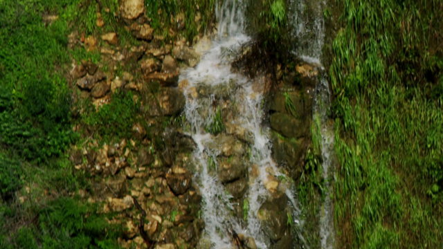 Royalty Free Stock Video Footage of side and bottom of waterfall shot in Israel at 4k with Red.