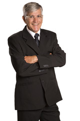 Smiling businessman with arms crossed.
