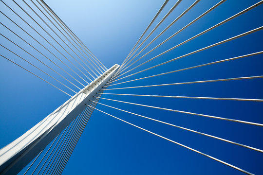 Fototapeta Wonderful white bridge structure over clear blue sky