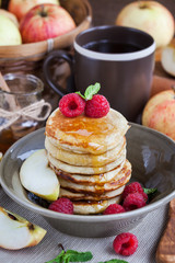 Breakfast with apple pancakes with honey