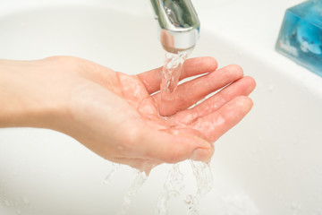 Hygiene. Cleaning Hands. Washing hands with soap and water.