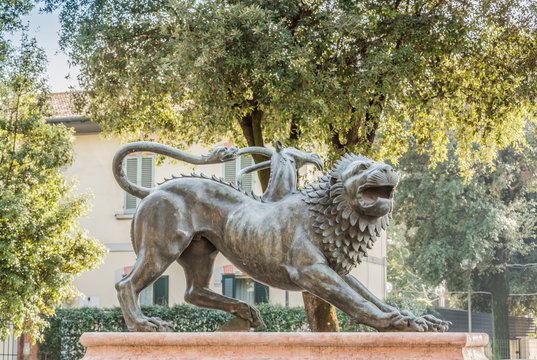Mythological bronze monument representing the Etruscan city of Arezzo in Tuscany Italy. The monument is located at the entrance of the town in a fountain.
