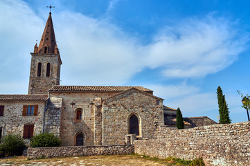 Fototapeta na wymiar the medieval church with belfry in France.