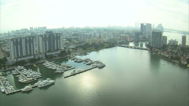 Aerial shot of Miami buildings and harbors.