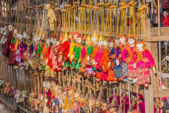 Traditional handicraft puppets are sold in a shop in Bagan, Myan