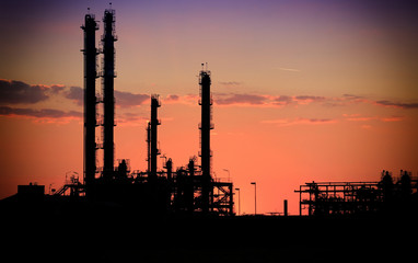 Oil refinery at sunset - 100163235