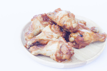 Grilled chicken wings isolated on white background