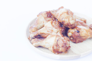 Grilled chicken wings isolated on white background