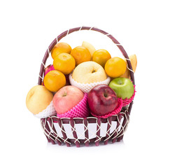 Fresh fruit in the basket against a white background