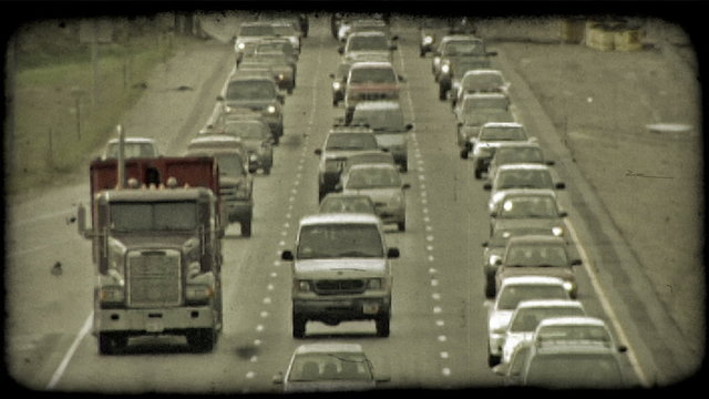 Cars in traffic 2. Vintage stylized video clip.